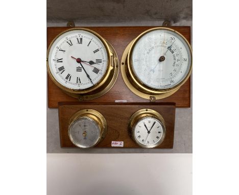 Marine brass cased aneroid barometer by Tempora &amp; a similar clock by Sewell's Liverpool each 17cm dam, mounted on a woode