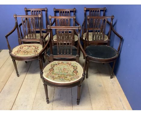 Set of 8 Regency style mahogany round seat arm chairs. Condition: General wear, 1 seat front cracked, 6 tapestry cushion cove