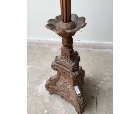 Good C19th carved pine column stand on a triform base 139 cm H converted to a lamp stand.  Condition generally good.  Some we