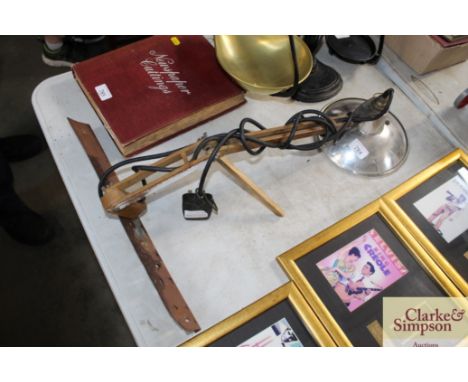 An angle poised type workshop lamp