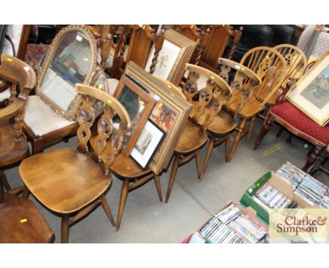 A pair of stick and wheelback chairs and a set of four wooden chairs