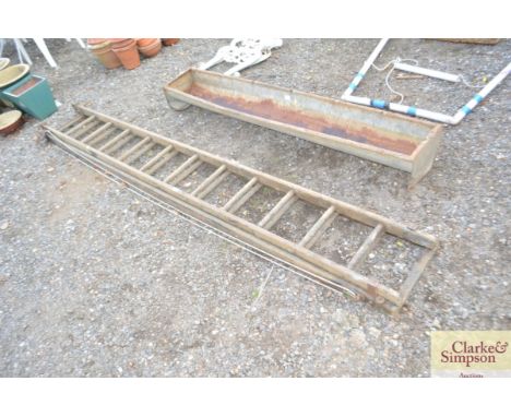 A wooden extending ladder
