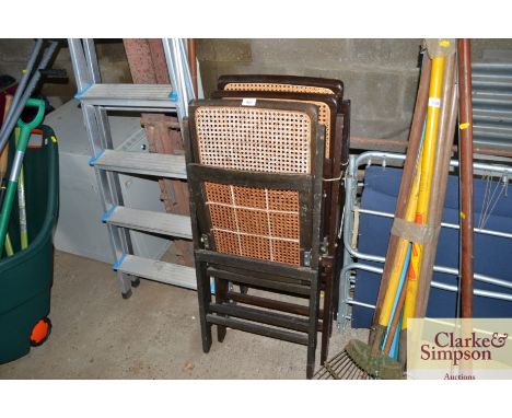 Three cane and wooden folding garden chairs