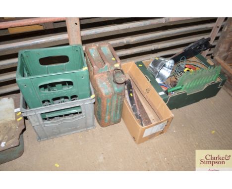 Two plastic crates, jerry can, large hinges and box containing saws and other garden items