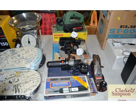 A Bosch sander; Black &amp; Decker heat gun; Black &amp; Decker cordless drill and a Stanley plane