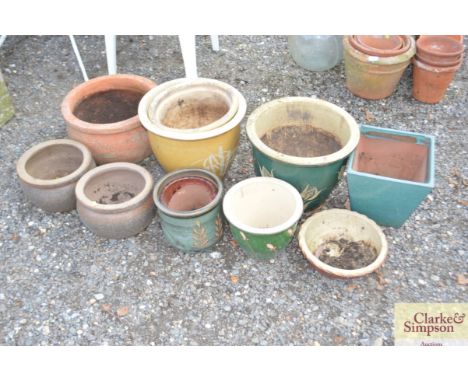 A large quantity of large garden planters