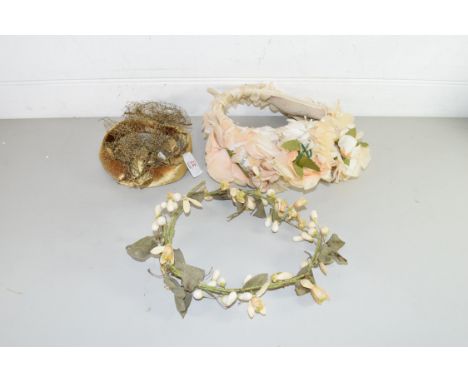 THREE VINTAGE FLORAL DECORATED HAIR PIECES