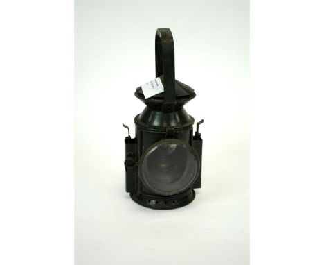 A Second world war period Wakefield Birmingham tri-colour paraffin railway lamp, in a dark green painted colour way, 32cm hig