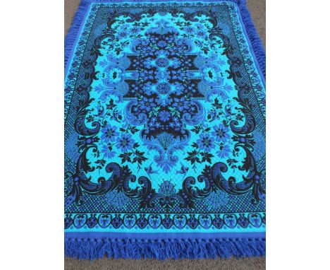 53071 - 19 - A Casa Pupo carpet, the turquoise field of Rococo vines centred by a charcoal panel enclosed by narrow borders, 