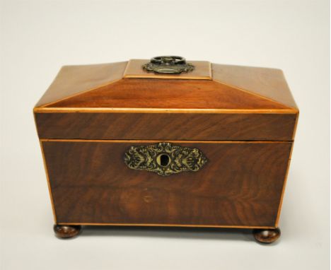 A small 19 th century sarcophagus shaped tea caddy, principally veneered in walnut with satin wood inlaid borders, the hinged