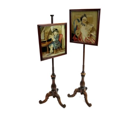 A pair of Victorian rosewood telescopic pole screens mid-19 th century each with rectangular tapestry panels of an old maid r