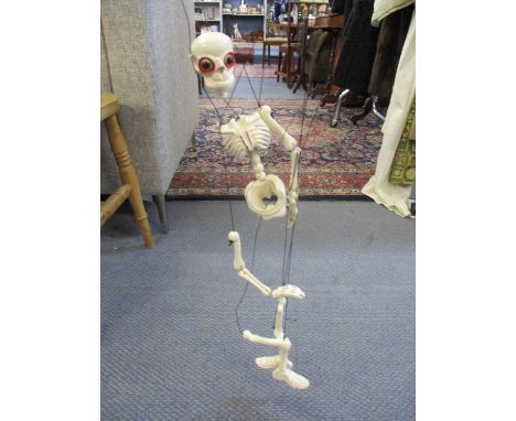 A Pelham skeleton puppet in original box 