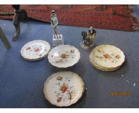 A German figure of a soldier and a mid 20th century figure of an Irish spinner, together with a Victorian W & R earthenware d
