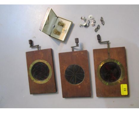 Three Victorian Kaleidoscopic lantern slides and a group of cuff linksLocation: PORT 