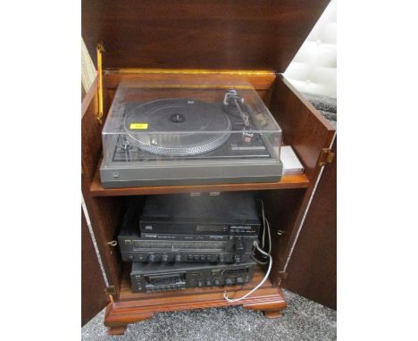 A stereo comprising of a Nad 6050c cassette tape deck, a Nad amplifier, a Ferguson CD player, a Dual 505 record player and a 
