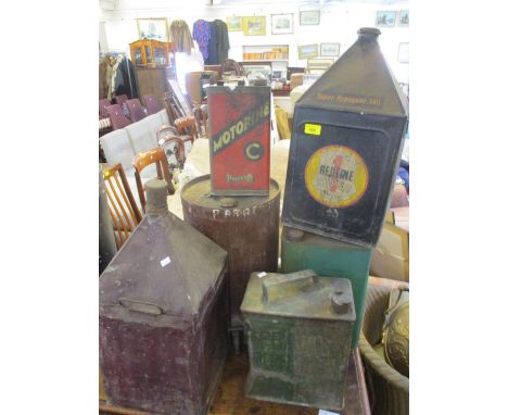 Six mixed vintage cans to include a Redline Super oil can, Motoring oil can, petrol can and others 