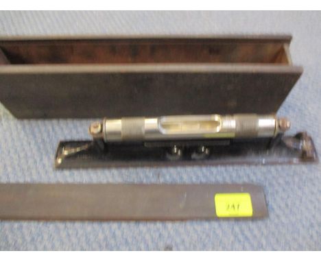 An American L S Starrett Co spirit level in a treen box 