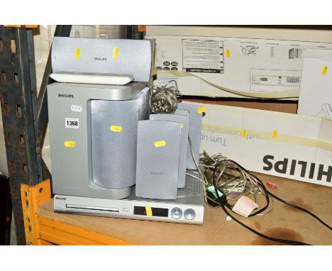 A PHILLIPS HTS3100 DVD SURROUND SYSTEM comprising of a sub woofer and five speakers (one remote)