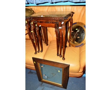 AN EARLY 20TH CENTURY OAK BOBBIN TURNED CANE SEATED STOOL, a mahogany nest of three tables, an oak drop leaf tea trolley, gil