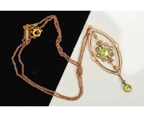 AN EARLY 20TH CENTURY PERIDOT AND SEED PEARL PENDANT, open work design, pendant measuring approximately 54mm in length, toget