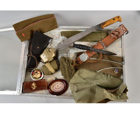 A LARGE GLASS TOP DEALER STYLE DISPLAY CASE CONTAINING THE FOLLOWING MILITARY ITEMS, WWII era or later webbing, believed Japa