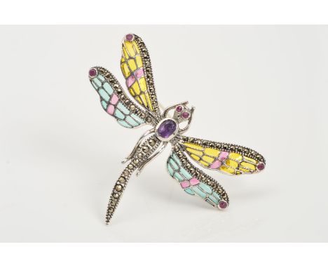 A PLIQUE-A-JOUR ENAMEL, GEM AND MARCASITE DRAGONFLY BROOCH/PENDANT, designed with an oval amethyst body, ruby eyes, yellow, g