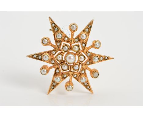 A 9CT GOLD SPLIT PEARL STAR BROOCH, of star outline set with tiers of vari-sized split pearls with 9ct gold hallmark for Lond