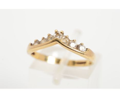 A 9CT GOLD CUBIC ZIRCONIA WISHBONE SHAPE RING, the wishbone line set with a row of circular colourless cubic zironias with 9c