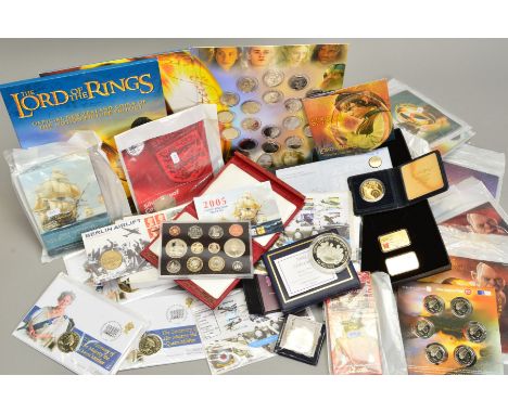 A BOX OF COINS, COMMEMORATIVES, YEAR SET PROOFS IN SILVER AND CUPRO-NICKEL, Lord of The Rings official New Zealand issues, to