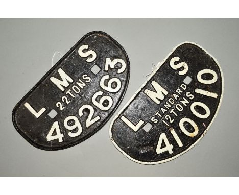 TWO L.M.S. CAST IRON WAGON PLATES, Standard 12 Tons 410010 and 22 Tons 492663, both repainted, raised white lettering on blac