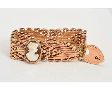 A 9CT GOLD BRACELET AND SINGLE CAMEO EARRING, the bracelet  of a fancy brick link design suspending a heart padlock clasp, ha