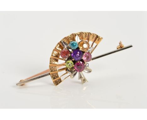 A 9CT GOLD MULTI GEM BROOCH, the cluster of various circular gems to include amethyst, citrine and peridot in a floral cluste