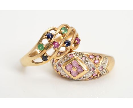 TWO 9CT GOLD GEM RINGS, the first of openwork design claw set with emeralds, sapphires and rubies, ring size P, together with