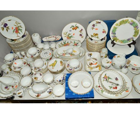 A ROYAL WORCESTER EVESHAM PATTERN DINNER SERVICE, including serving and flan dishes, over 110 pieces, together with other Roy