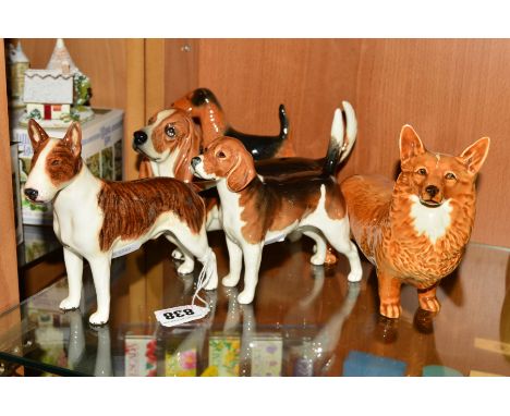 FOUR BESWICK DOGS, Bull Terrier 'Romany Rhinestone' No970, Corgi No1299B, Beagle 'Wendover Billy' No1933A and Basset Hound 'F