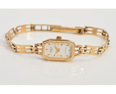 A LADY'S 9CT GOLD ROTARY WRIST WATCH, the elongated octagonal head with white face and baton hour markers to the textured str