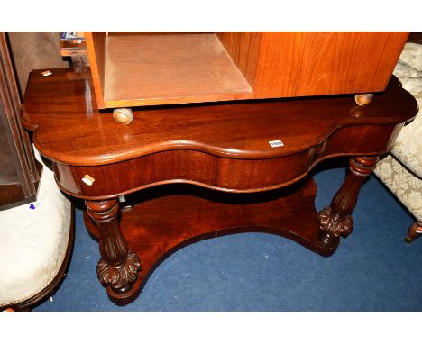 A VICTORIAN MAHOGANY CONSOLE TABLE, with a single drawer, flanked by shaped front uprights and an undershelf, width 121cm x d