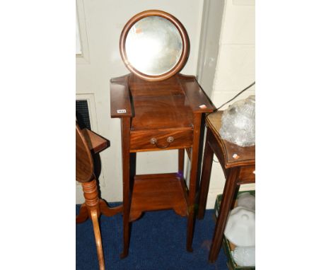 AN EDWARDIAN MAHOGANY VANITY CIRCULAR MIRROR, of a square form, single drawer on a tapering frame united by an under shelf, w