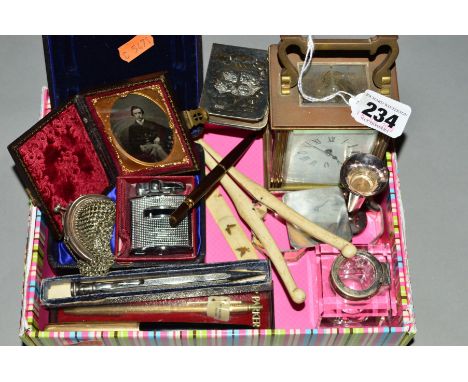 A BOX OF SILVER AND COLLECTABLES, including a brass cased carriage clock, a pair of silver octagonal napkin rings, Reynold's 