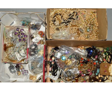 THREE BOXES OF COSTUME JEWELLERY, to include a pair of Trifari ear clips, a pair of abalone shell ear clips, floral bone chin