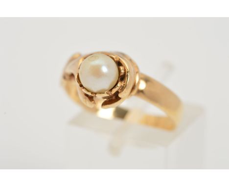 A 9CT GOLD CULTURED PEARL RING, designed as a hand holding a cultured pearl to the plain band with 9ct hallmark for Birmingha