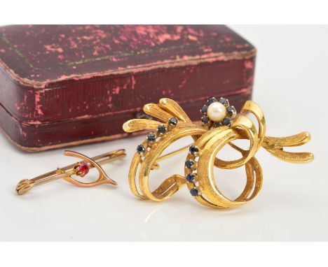 TWO BROOCHES, the first an 18ct gold sapphire and cultured pearl brooch of scrolling floral design, the flower set with a cul