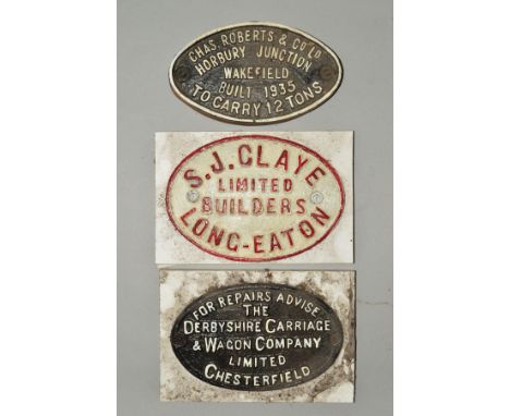 THREE ASSORTED OVAL CAST IRON RAILWAY WAGON PLATES, 'S.J. Claye Limited Builders Long-Eaton', raised red lettering and edging