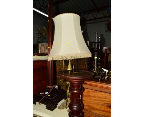 AN EDWARDIAN MAHOGANY COLUMN STANDARD LAMP on a square base, together with a brass table lamp with shades and a pair of metal