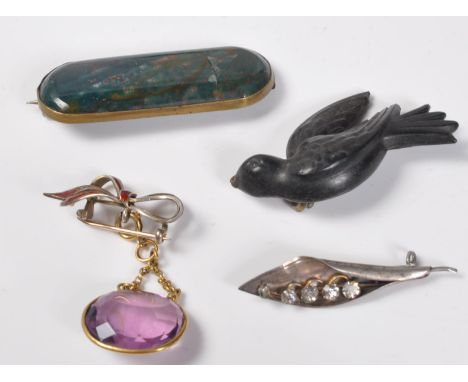 A collection of 20th Century and antique jewellery to include a Victorian bog oak bird brooch (AF), A stamped 800 bow brooch 