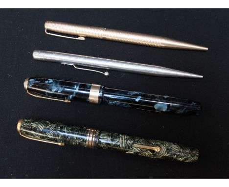 A group of four vintage pens including two Conway Stewart fountain pens with 14ct gold nibs, an engine turned rolled gold pro