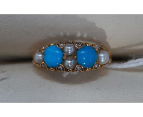 An 18ct gold ring with carved shoulders, set with turquoise, seed pearls and diamonds, circa 1920, approx. 3.6 grams.