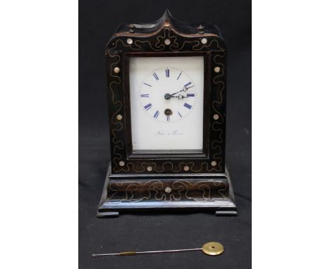 A small 19th century French ebonised mantle clock by Molé of Paris, with white enamel dial and blue Roman numerals, the case 