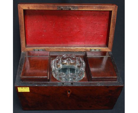 An early 19th century mahogany rectangular tea caddy, with twin interior boxes and later glass mixing bowl.