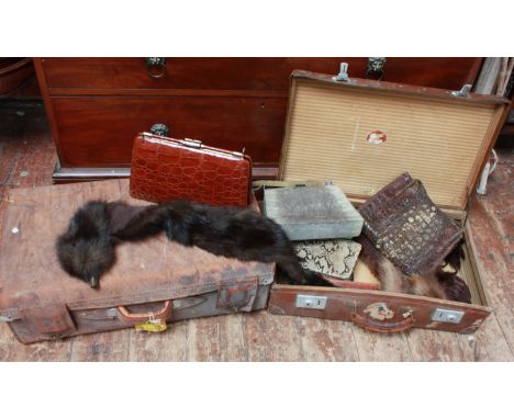 Two vintage leather suitcases, four handbags and two fur stoles.